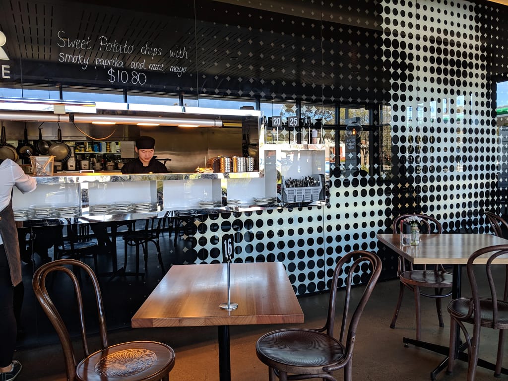 Cafe interior near Westfield Marion with brunch and coffee