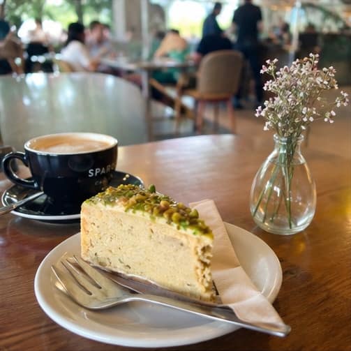 Fresh cake and coffee served at Spargo's Cafe + Bar, a popular brunch cafe in South Australia